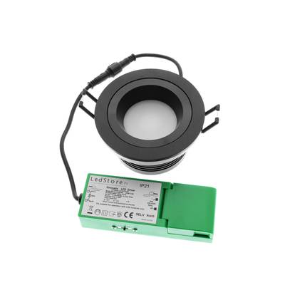 Spot encastré à LED noir avec driver LED vert et fil noir sur fond blanc - une solution d'éclairage économe en énergie.
