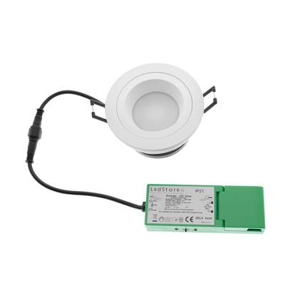 Downlight LED rond avec clips métalliques, connecté à une alimentation verte avec un câble noir. Idéal pour un éclairage intérieur économe en énergie.