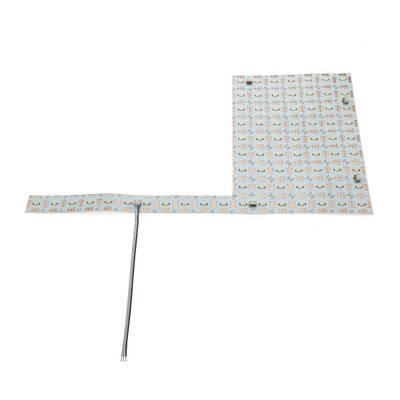 Bande LED flexible en forme de L avec petits modules LED, connecteur et rallonges ; idéale pour des solutions d'éclairage polyvalentes.