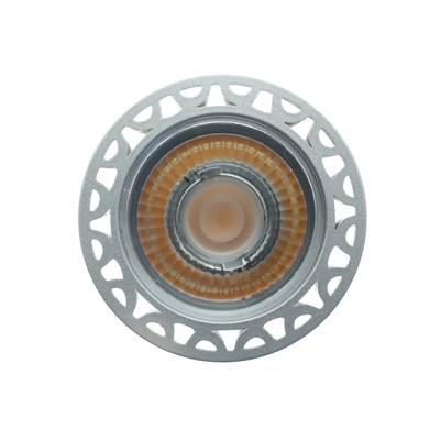 Projecteur LED, corps rond argenté, réflecteur interne orange, conception d'éclairage économe en énergie.