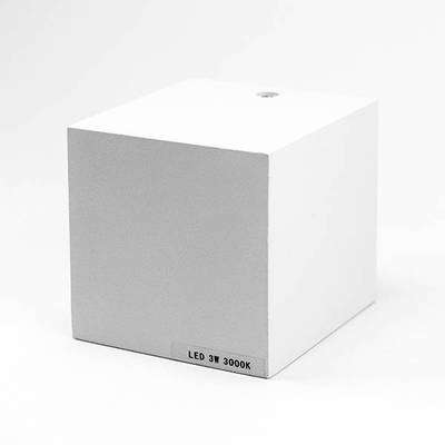 Lampe LED cubique blanche avec luminaire rond, étiquetée "LED 3W 3000K", parfaite pour les solutions d'éclairage modernes. Idéal pour un éclairage économe en énergie.
