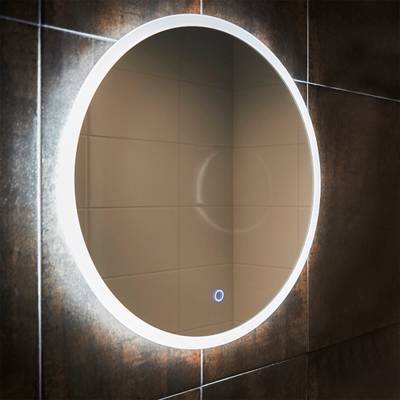 Miroir rond éclairé avec capteur tactile sur un mur carrelé, mettant en valeur l'élégance de l'éclairage LED dans une salle de bains moderne.