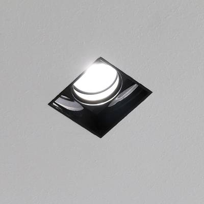 Plafonnier encastré rectangulaire avec une ampoule brillante sur un plafond blanc texturé - parfait pour l'éclairage d'une maison moderne.