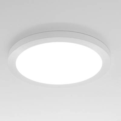 Plafonnier LED rond, blanc et lumineux, monté sur un plafond blanc pour améliorer l'éclairage d'une maison moderne. Idéal pour un éclairage économe en énergie.