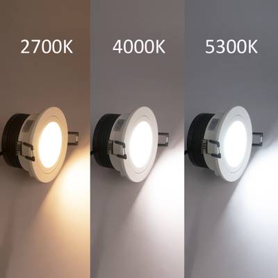 Trois downlights côte à côte avec un éclairage blanc chaud de 2700K, neutre de 4000K et froid de 5300K.