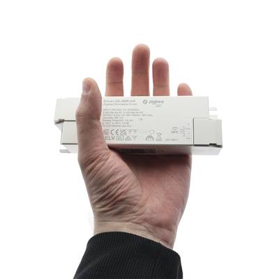 Contrôleur d'éclairage LED portable avec symboles et textes imprimés pour des solutions d'éclairage intelligentes et efficaces.