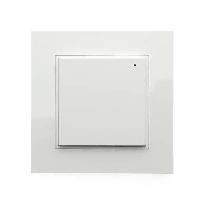 Interrupteur à LED blanc minimaliste et carré, avec un petit point noir dans le coin supérieur droit, sur fond blanc.