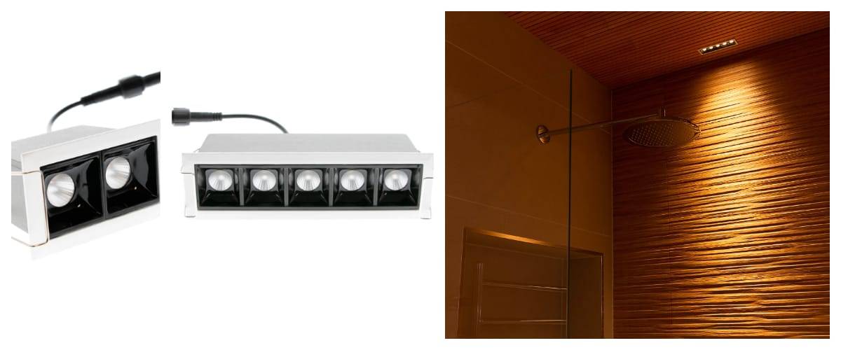 Gros plan sur deux plafonniers LED rectangulaires à ampoules multiples sur le côté gauche. À droite, la douche moderne présente un mur brun texturé, une pomme de douche de tête et un plafonnier à LED similaire pour créer une atmosphère chaleureuse. Découvrez des solutions d'éclairage similaires dans la boutique en ligne LedStore.fi !